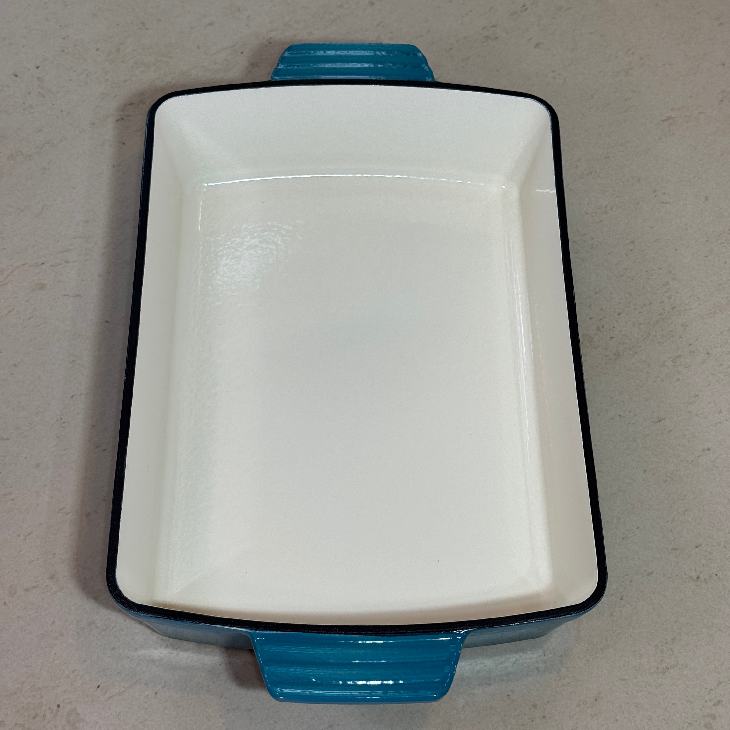 Plat à rôtir en fonte émaillée turquoise parfait pour hachis parmentier, gratin dauphinois et plats mijotés au four