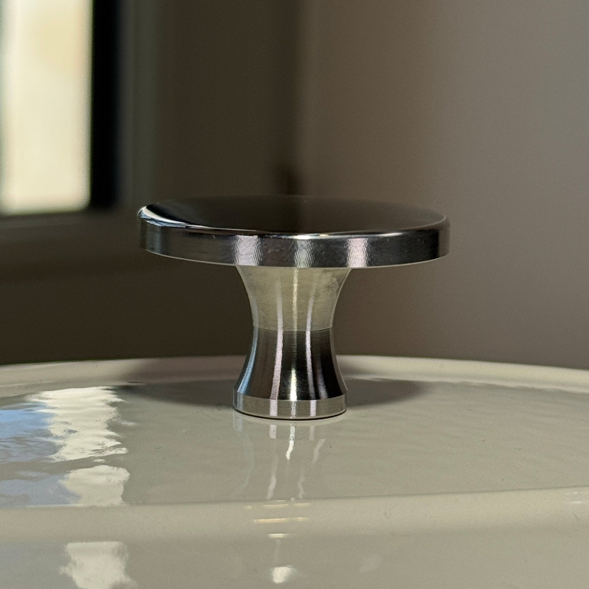 Bouton argenté brillant adaptable sur tous les couvercles