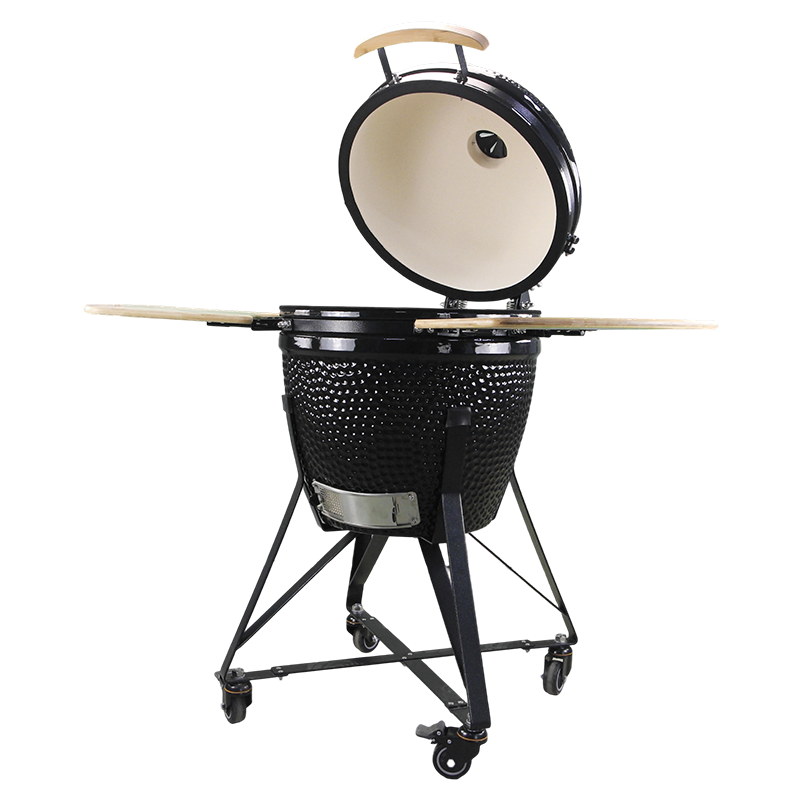 Barbecue kamado noir ouvert avec intérieur en céramique pour cuisson lente, fumage et grillades