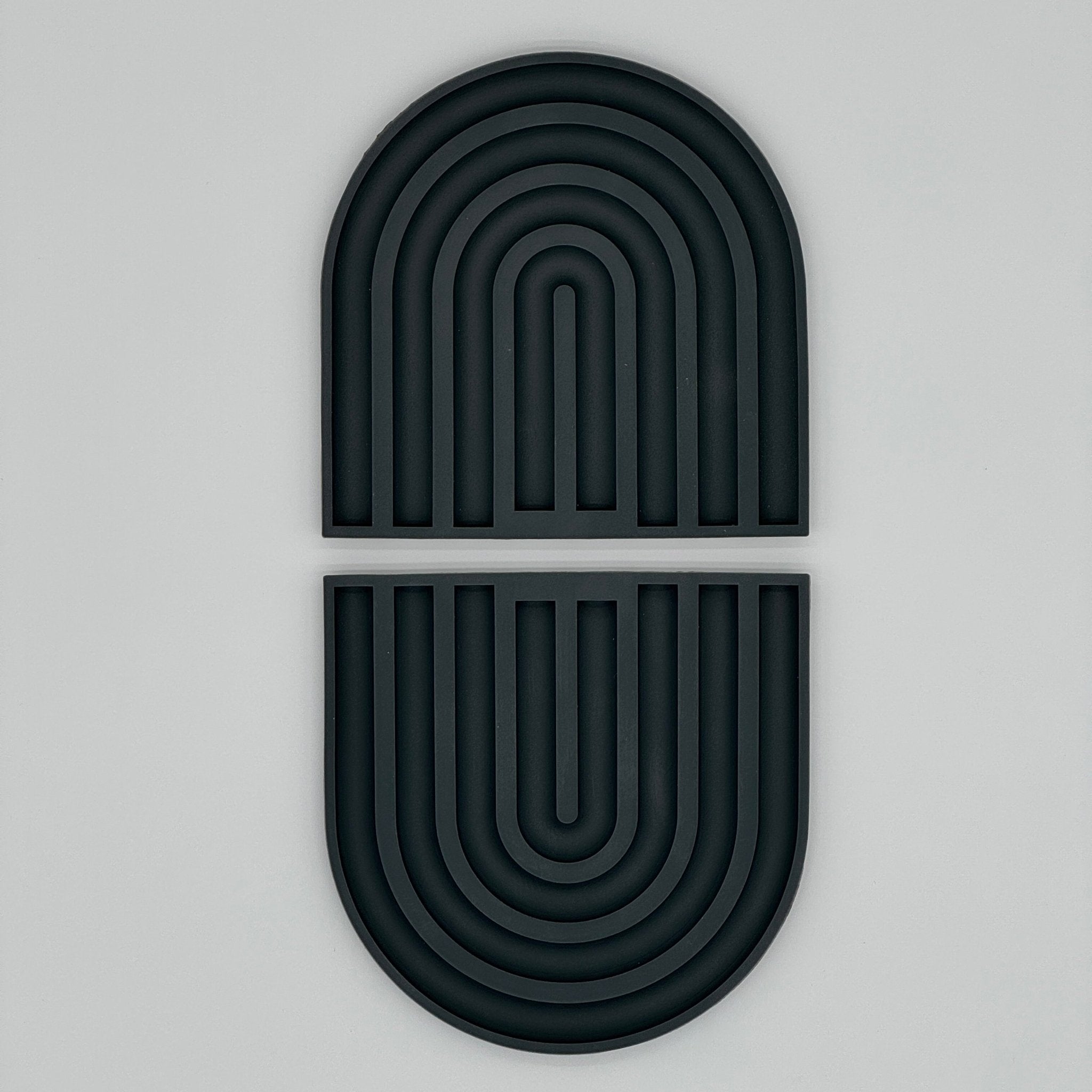 Dessous de plat silicone noir résistant 240°C, utilisable en manique antidérapante pour cocottes et faitouts