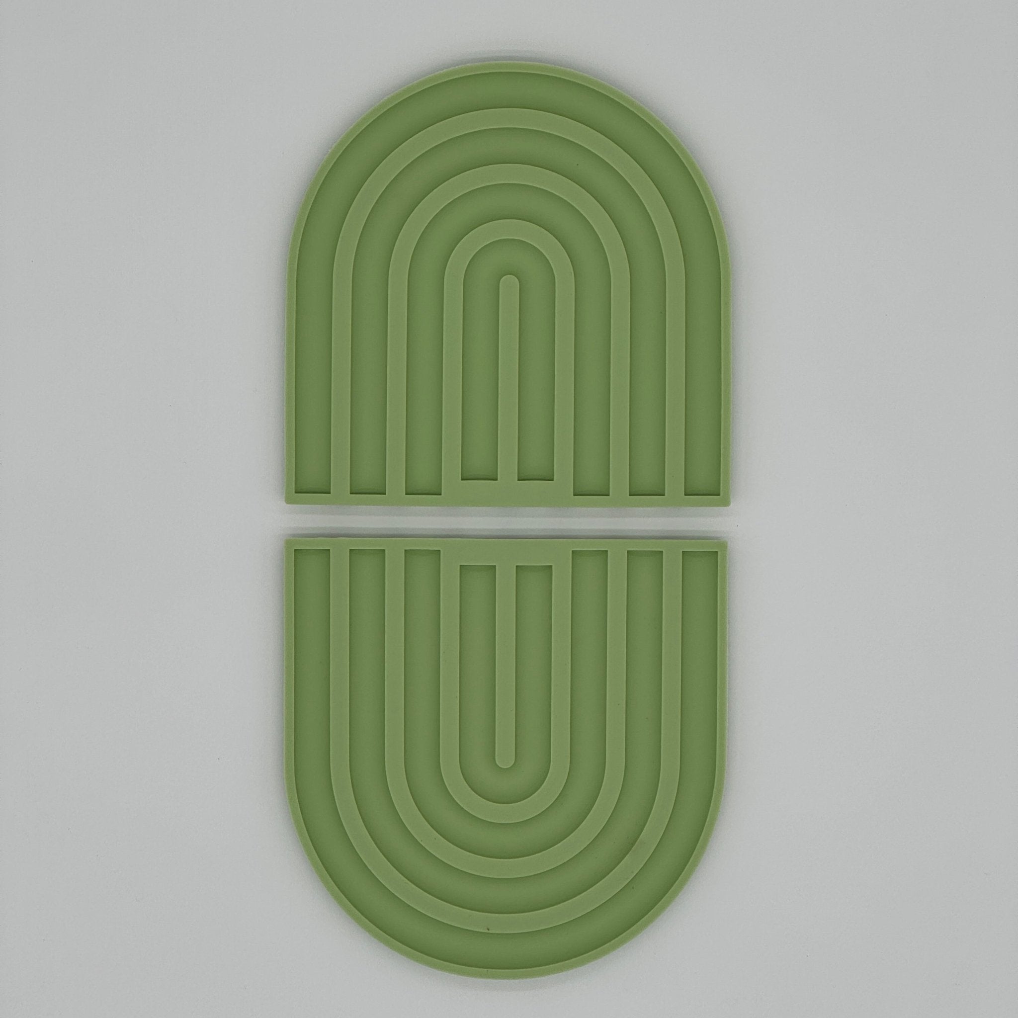 Dessous de plat silicone vert résistant 240°C, utilisable en manique antidérapante pour cocottes et faitouts, prise en main