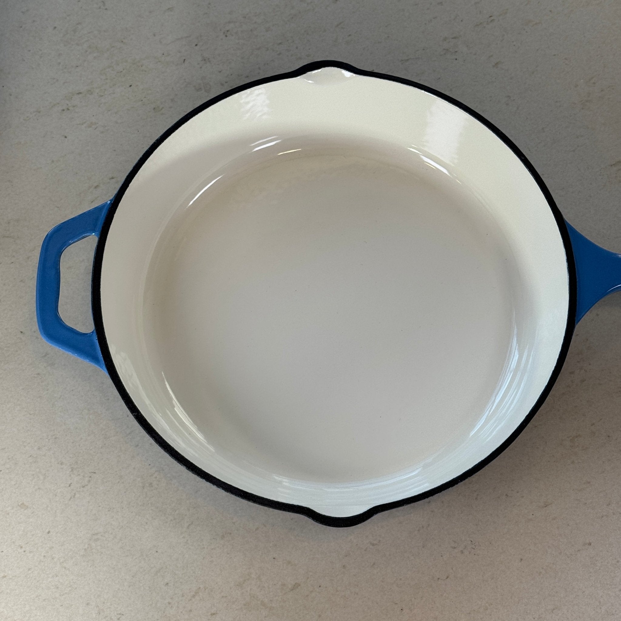 Intérieur poêle ronde bleu perle fonte émaillée 