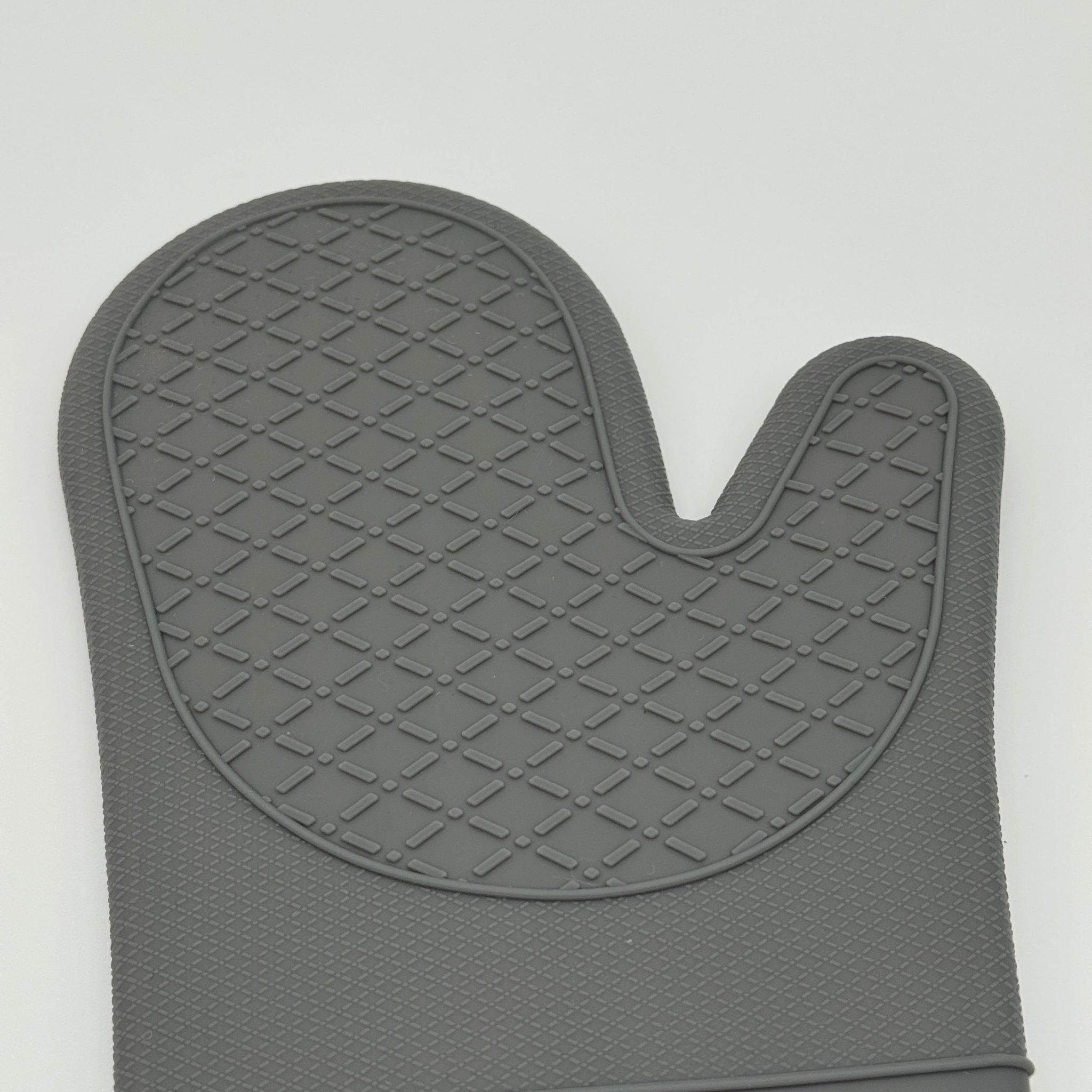 Manique en silicone antidérapante idéale pour saisir une cocotte en fonte chaude sans risque de glisse