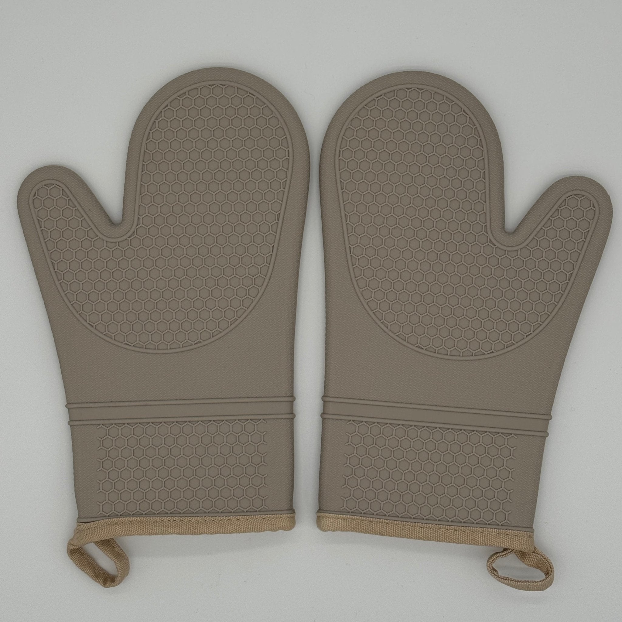Paire de gants de cuisine en silicone beige avec doublure coton pour une protection thermique optimale au quotidien