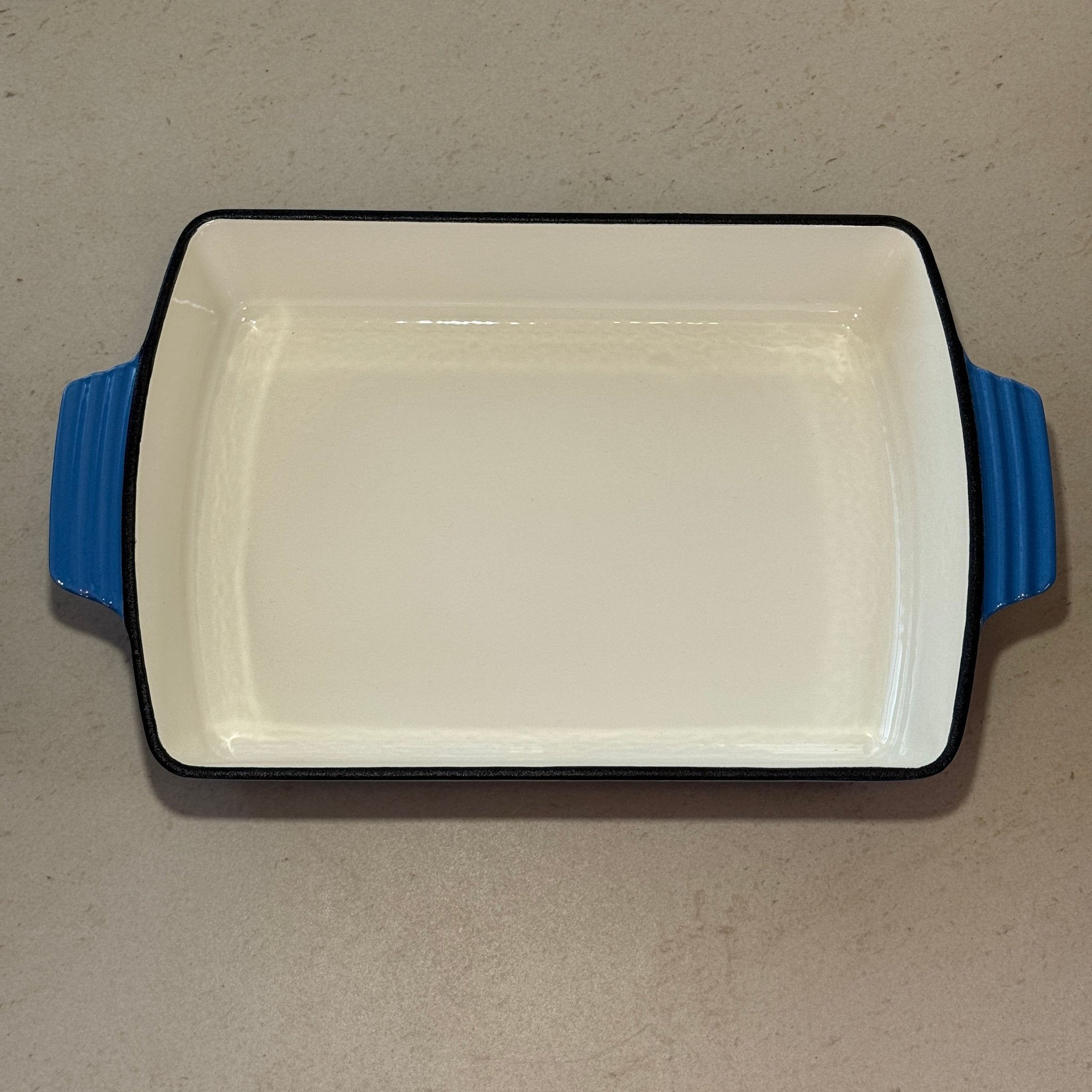 Plat à rôtir en fonte émaillée bleu perle idéal pour rôti de porc, poulet rôti, légumes confits et cuisson longue au four