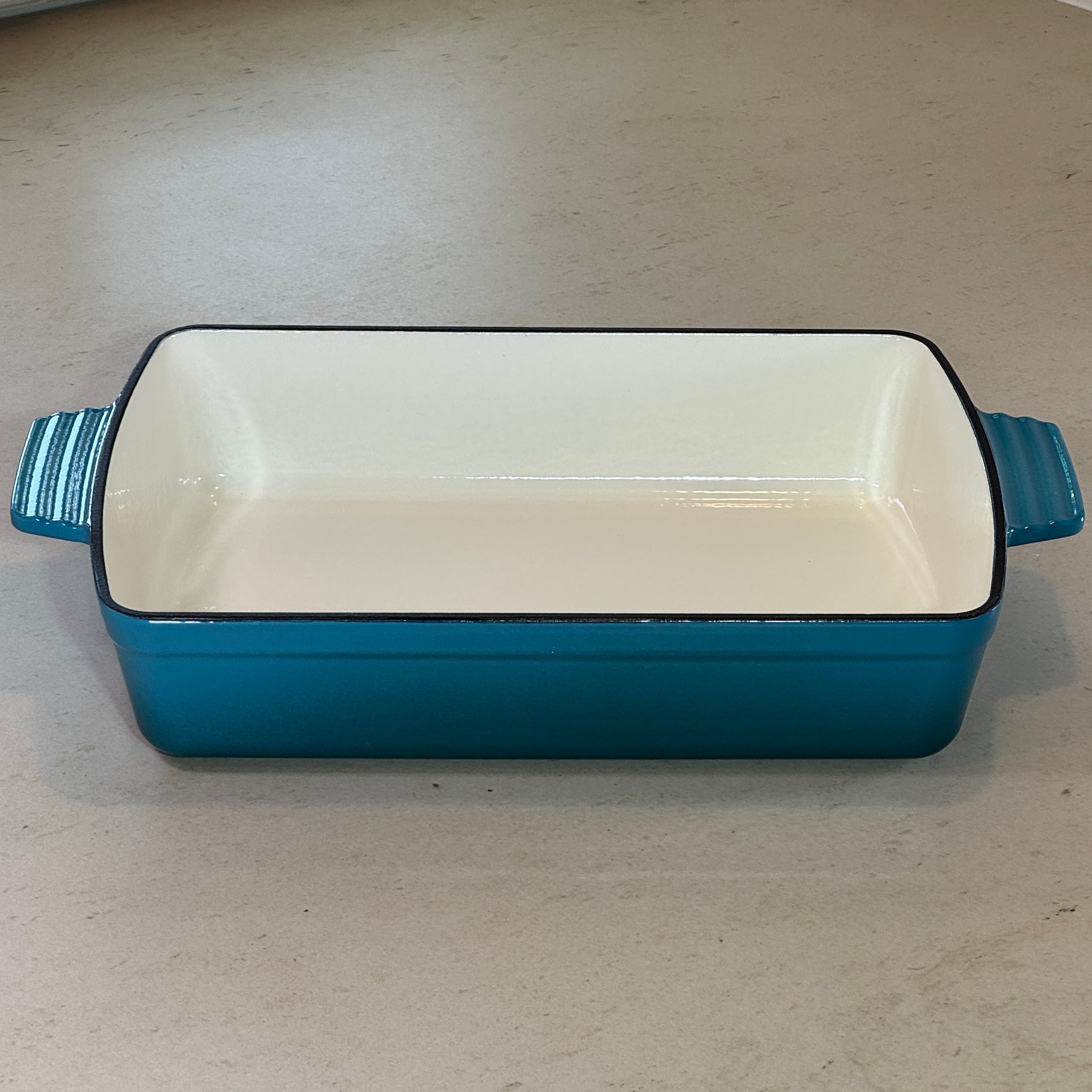 Plat à rôtir en fonte émaillée turquoise idéal pour rôti de porc, poulet rôti, légumes confits et cuisson longue au four