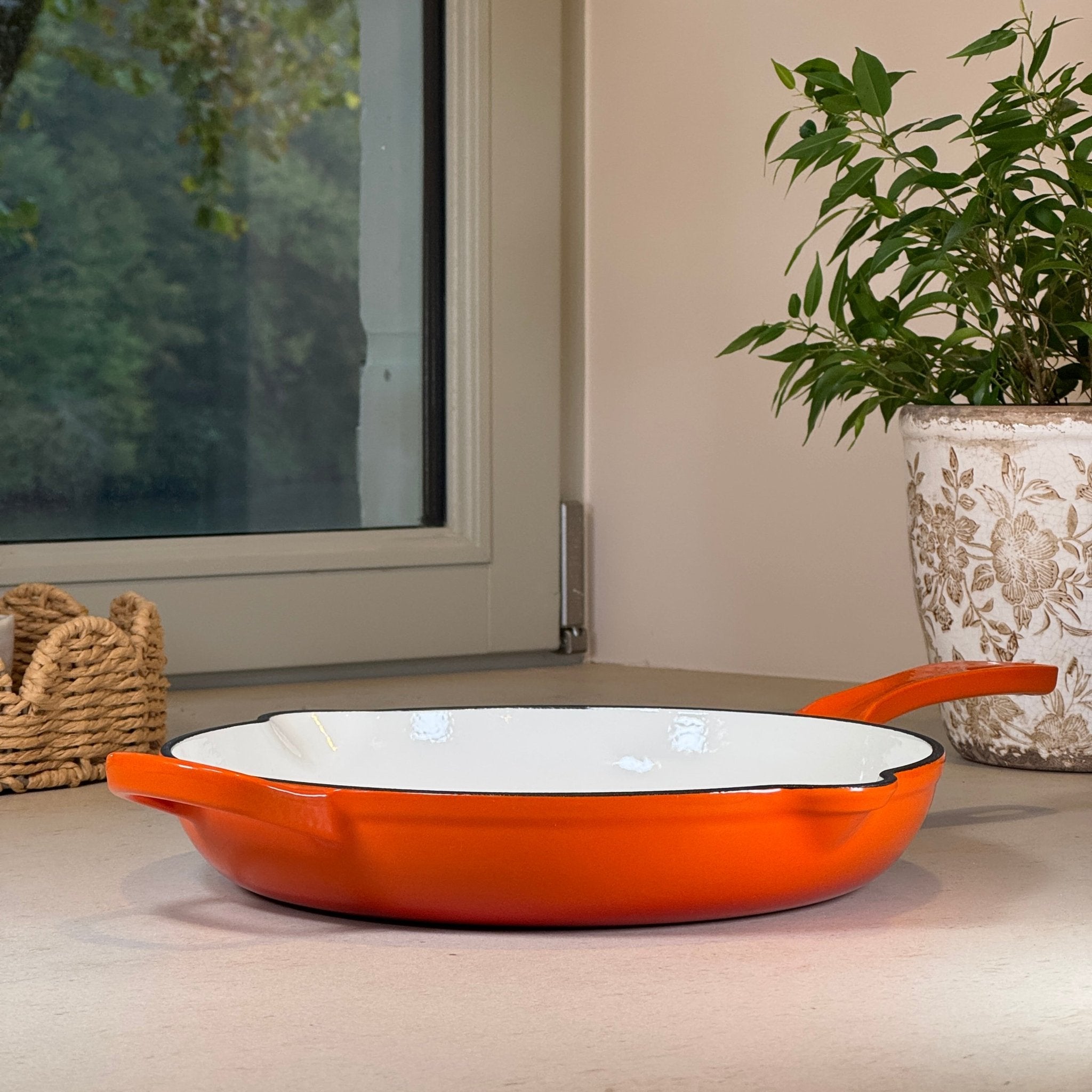 Poêle ronde en fonte émaillée Orange avec anse pour cuisson saisie et homogène